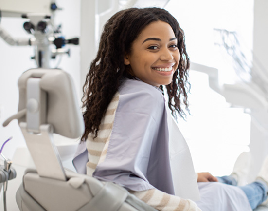 Smiling female dental patient